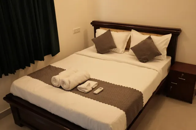 Bedroom at SKY Service Apartment