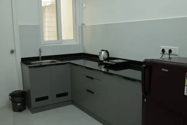 Kitchen at SKY Service Apartment